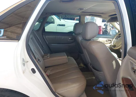 2000 Toyota Avalon Xls z USA, uszkodzony, nr VIN 4T1BF28B5YU043273